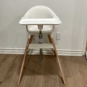 Almost brand new white Stokke Clikke high chair. Used less than 10 times.